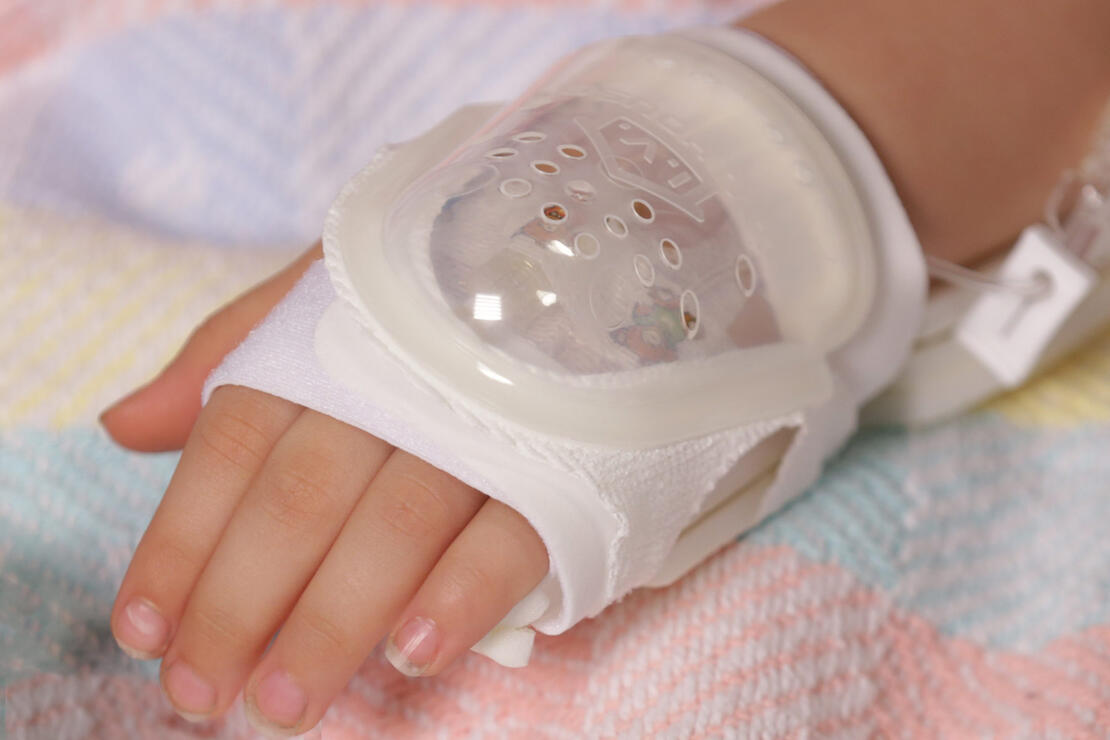 730S I.V. House UltraDressing on child's hand