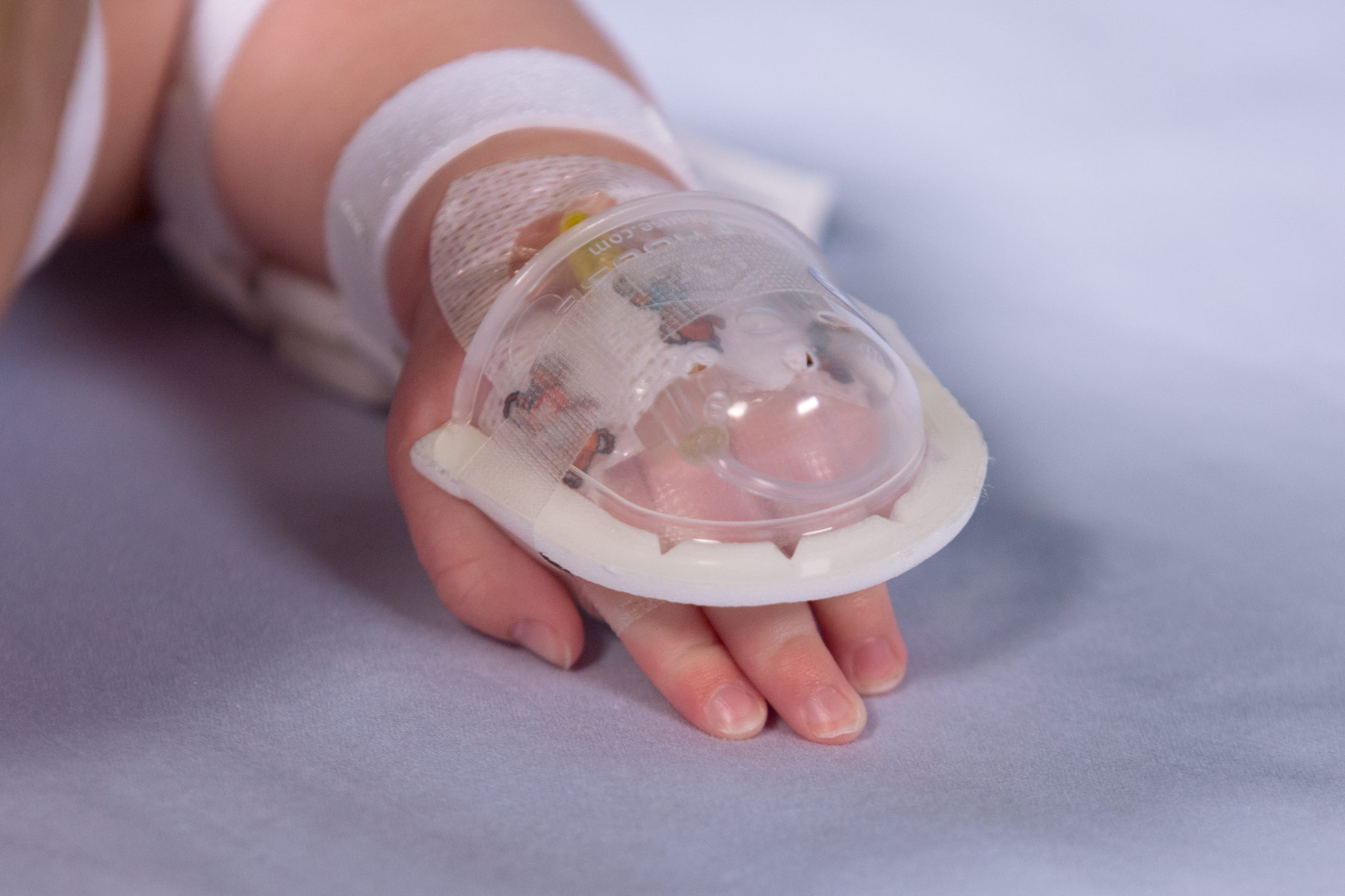 727SFP I.V. House UltraDome on infant's hand