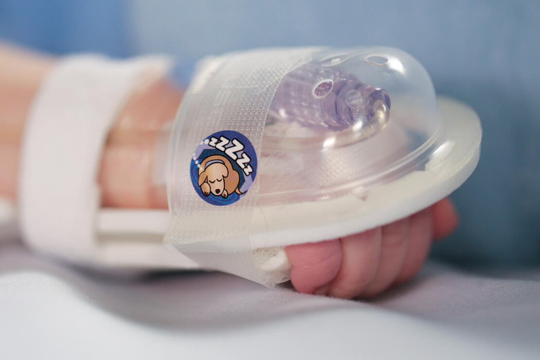 727SFP I.V. House UltraDome on infant's hand