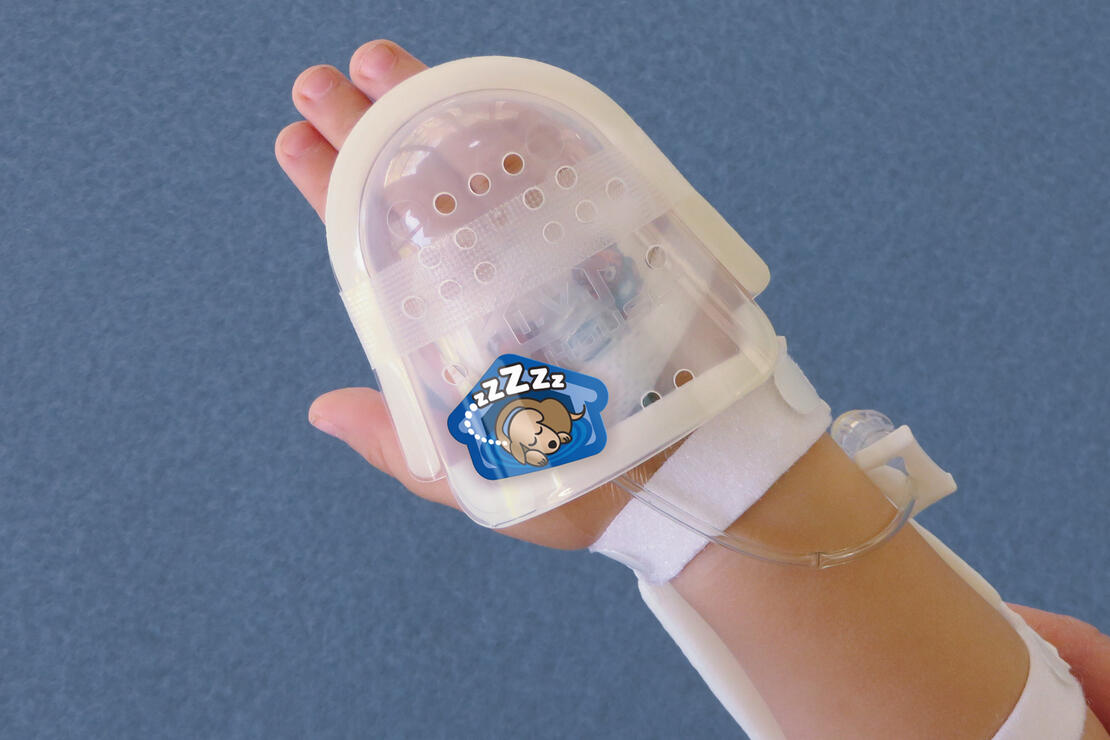 750LFP I.V. House UltraDome on toddler's hand