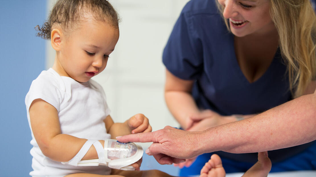 TLC Wrist Splint and I.V. House UltraDressing on a toddler