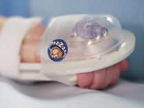 727SFP I.V. House UltraDome on infant's hand