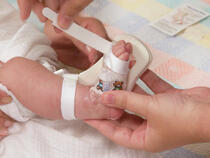 949XS TLC Splint with toe strap being applied