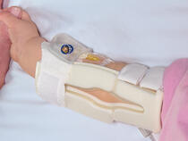 959S-W-Ultra TLC Elbow Splint on infant