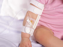 959S-W-Ultra TLC Elbow Splint and on infant